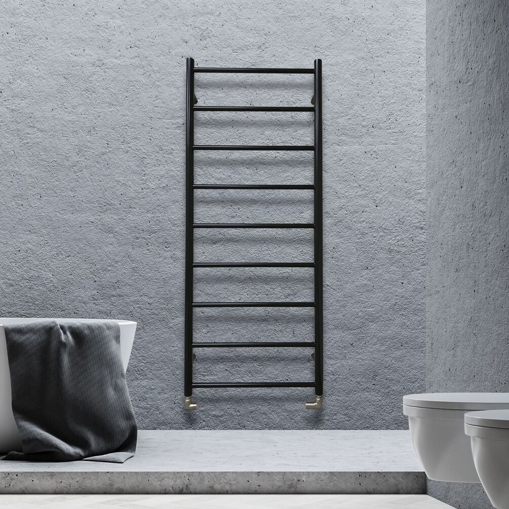 Lifestyle image of the The Sussex Range by JIS Lindfield 1275mm x 520mm Black Heated Towel Rail installed against a grey wall with a bathtub nearby